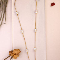 white bead necklace