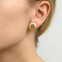 Golden Aura Studs earnings