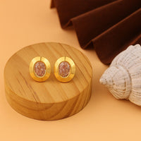 Golden Aura Studs earnings