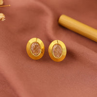 Golden Aura Studs earnings