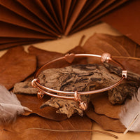 Whisper Bell Rose Gold Bangle